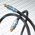Optical Toslink cable with black braided jacket and gold-plated connectors, coiled loop
