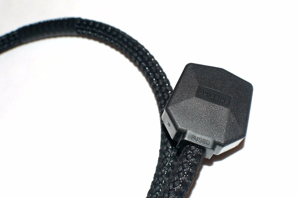 Black braided cable with dark connector housing and labeled ports