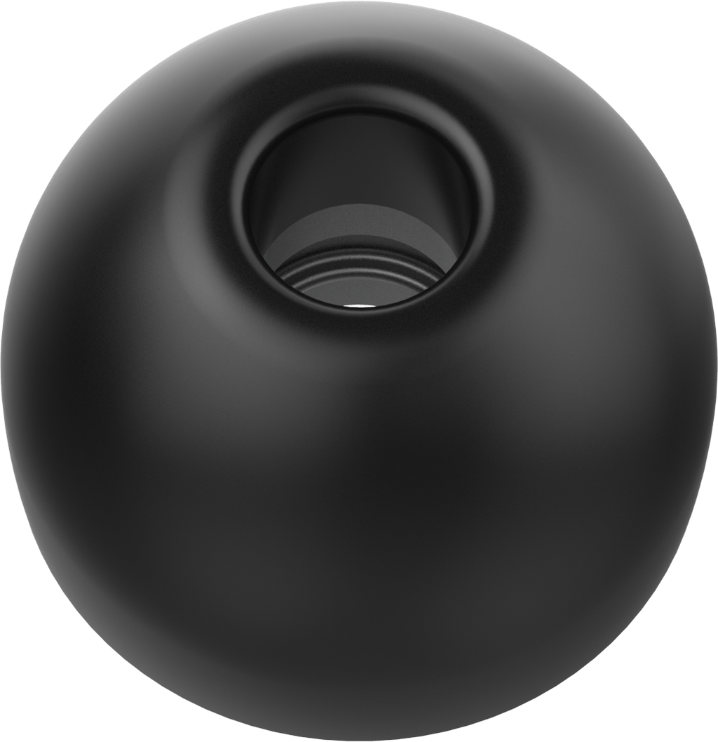 UCOFIT earbud tip back view, black oval body with central opening and inner ring