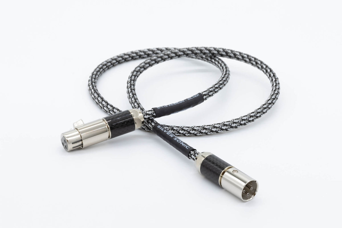 Silver braided digital audio cable with metal connectors and black cable segment