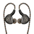 KEFINE Klanar in-ear headphones with black shells and dark gray silicone ear tips