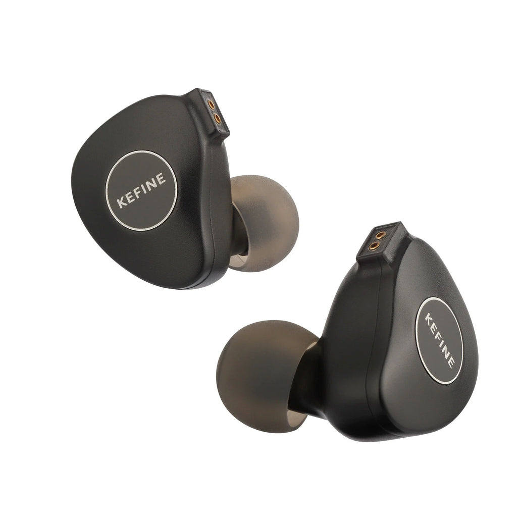 KEFINE Klanar in-ear headphones close-up, black earbuds with right/left indicators and tips