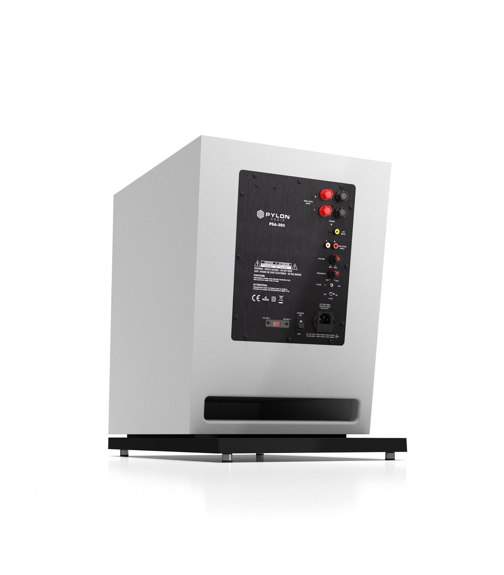 Natural wood subwoofer rear panel with connection terminals and controls