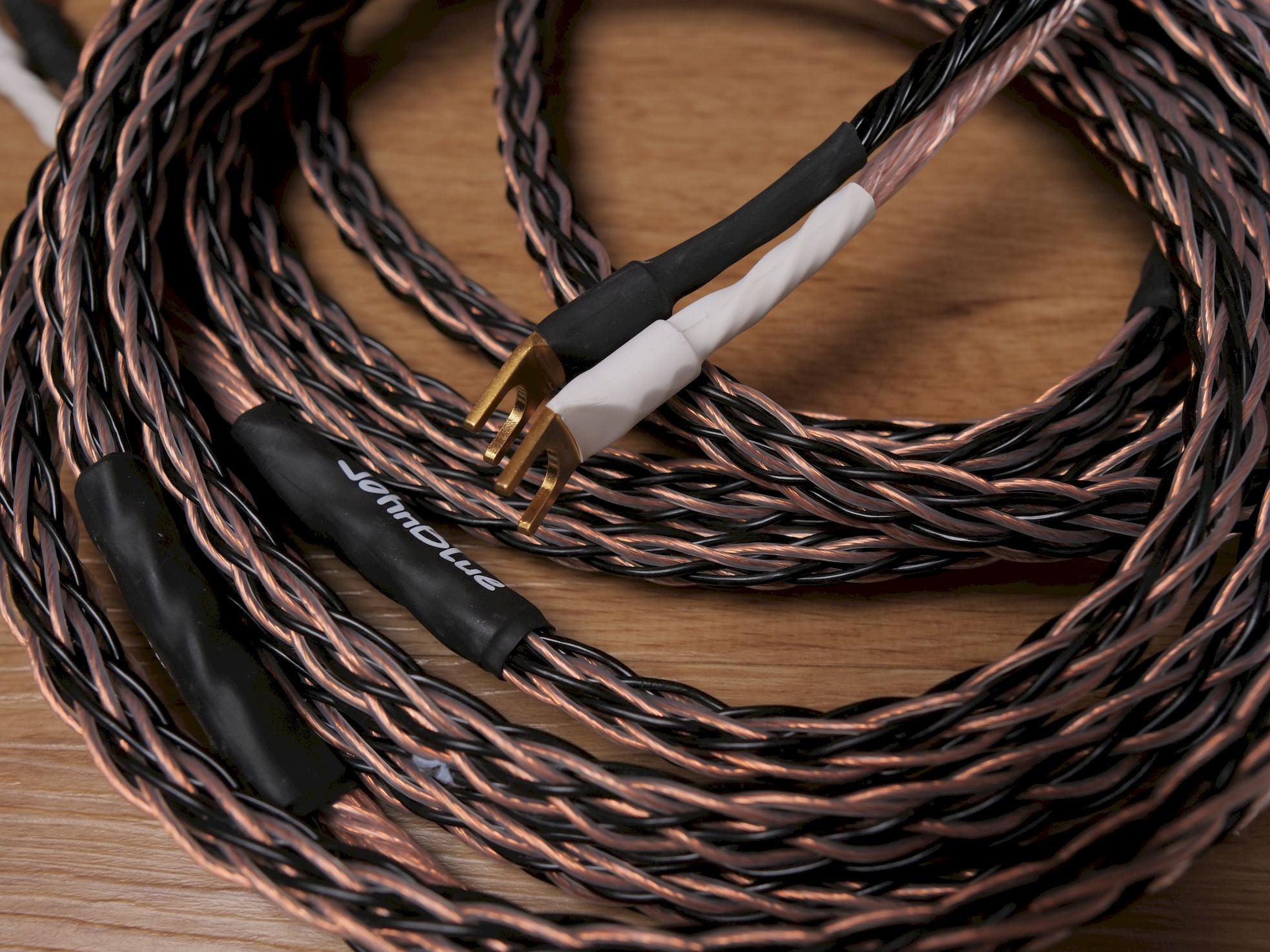 JohnBlue SC-88 speaker cable coil with gold banana connectors and black jacket