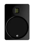 Black wall-mounted charging panel with circular outlet and USB port