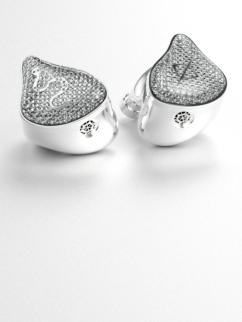 Two silver glitter in-ear audio earbuds with triangular crystal speaker faces