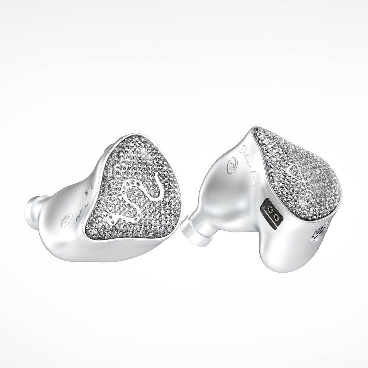 Silver-tone wireless earbuds with heart-shaped glitter face and white silicone tips