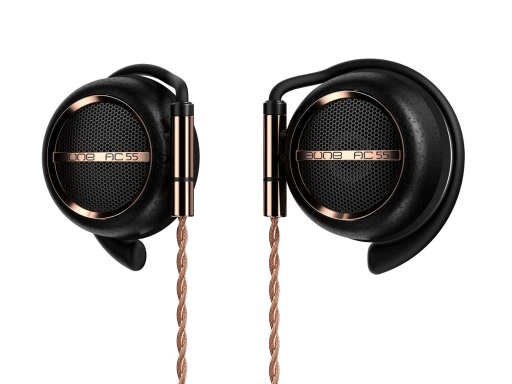 Black on-ear headphones with rose-gold accents and braided cable, centered earcups