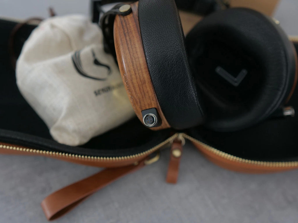 Black and wood headphone headband with cable cutout detail