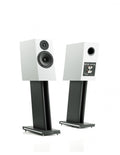 White monitor speaker pair with front tweeter and woofer on floor stands