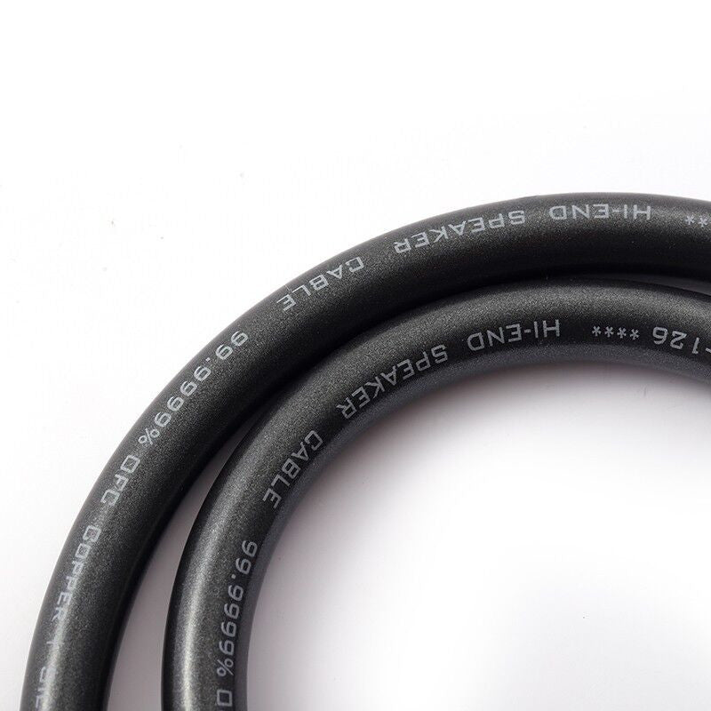Black electrical cable close-up showing printed text on the outer jacket