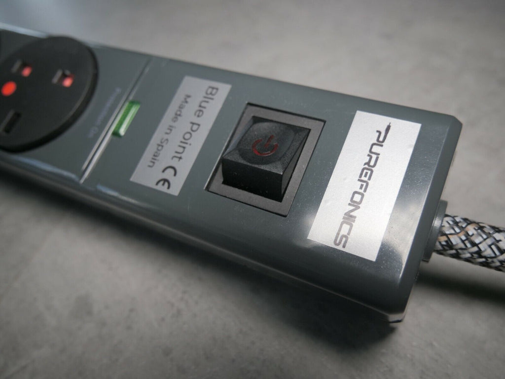 Power strip end panel with AC inlet and illuminated status indicator