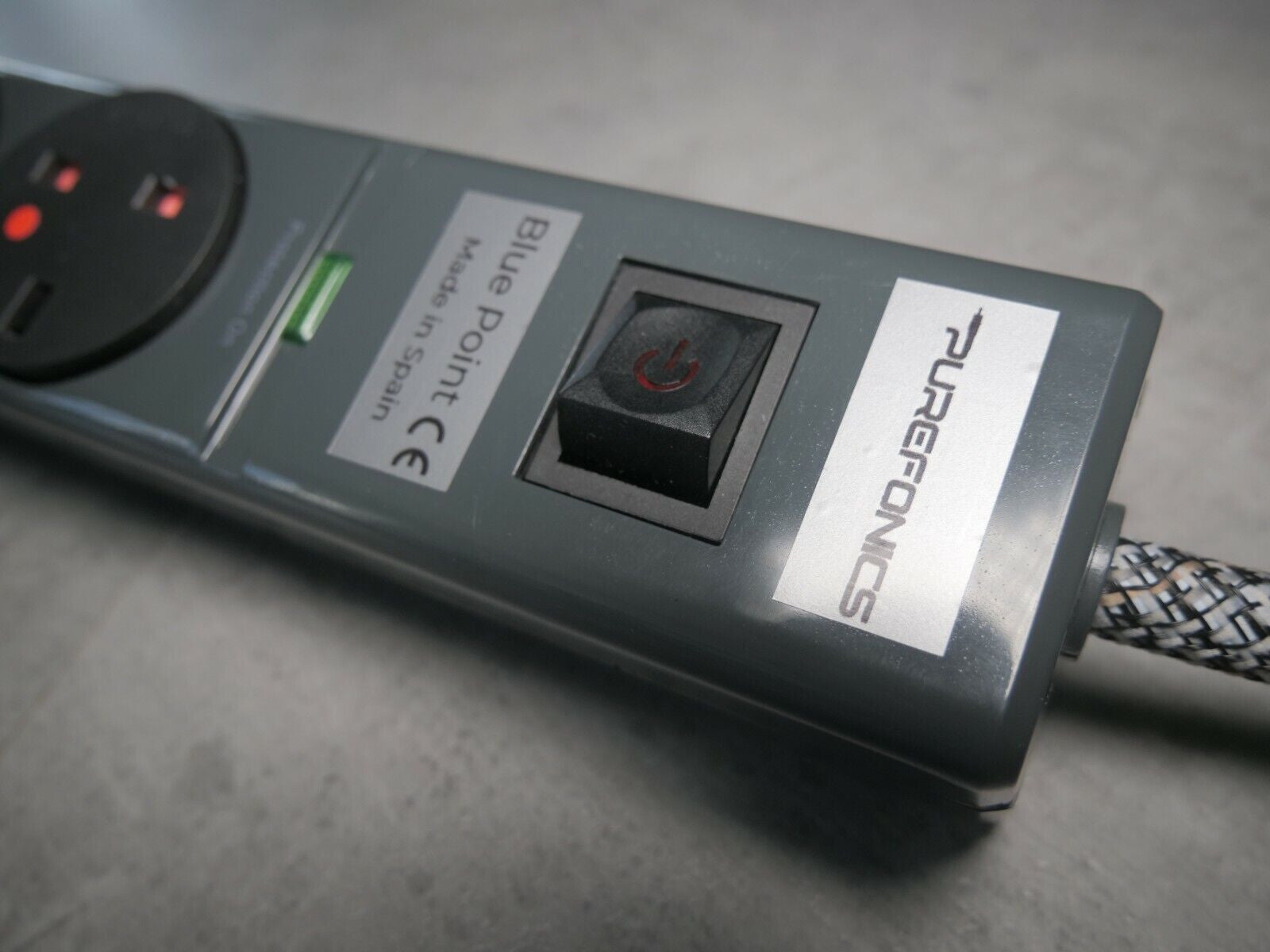 Power strip end panel with AC inlet and illuminated status indicator