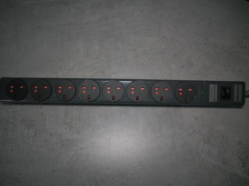 8-outlet power strip with round sockets and red indicator lights
