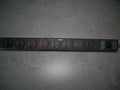 8-outlet power strip with round sockets and red indicator lights