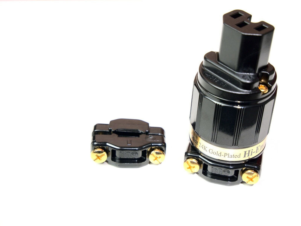 Black power plug adapter with three-prong socket and gold-toned contact screws