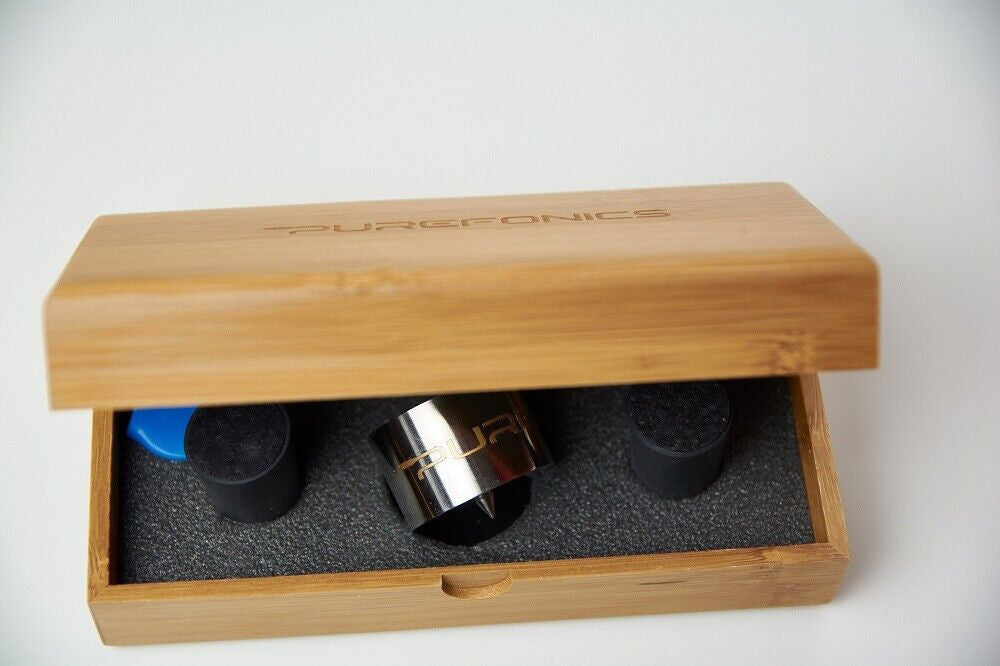 Wooden case insert with metal roller and four black felt pads