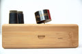 Wooden sound device case with metal roller and dark felt end caps