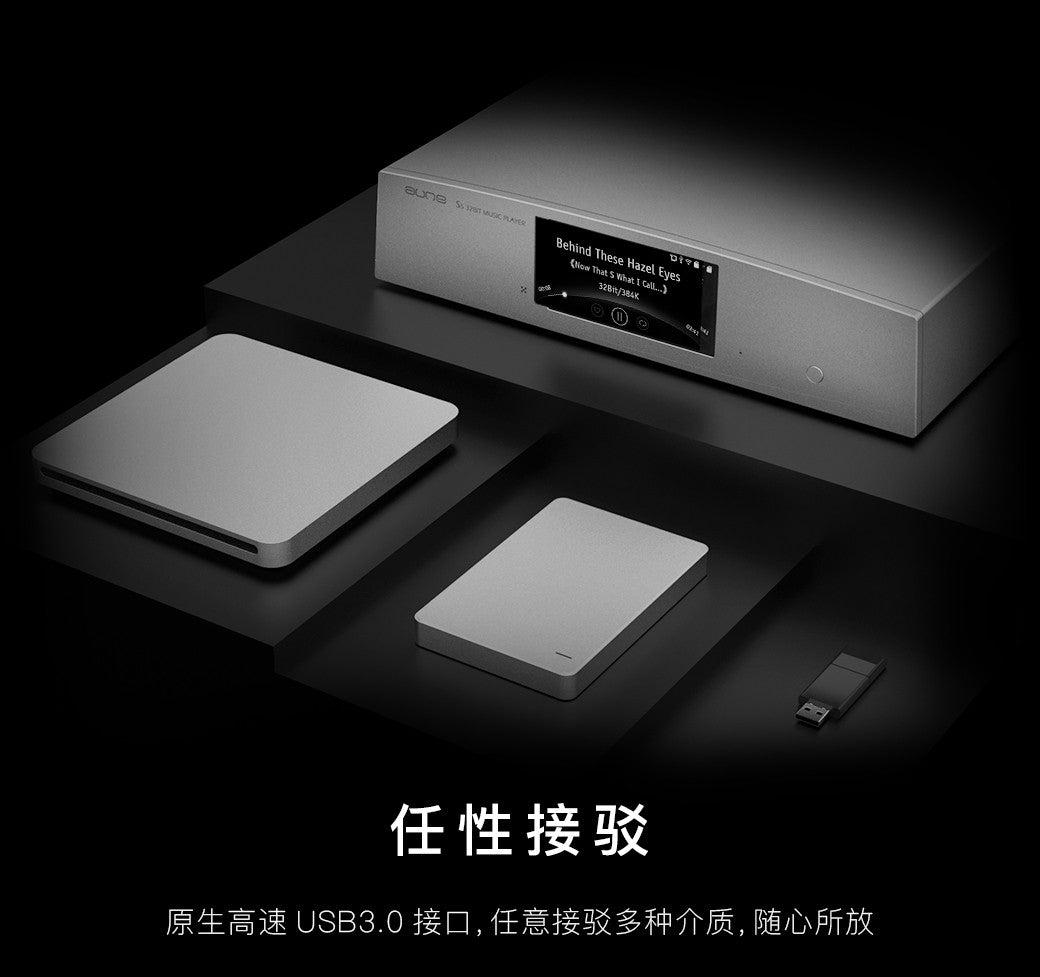 Silver network player transport with front display panel, angled view