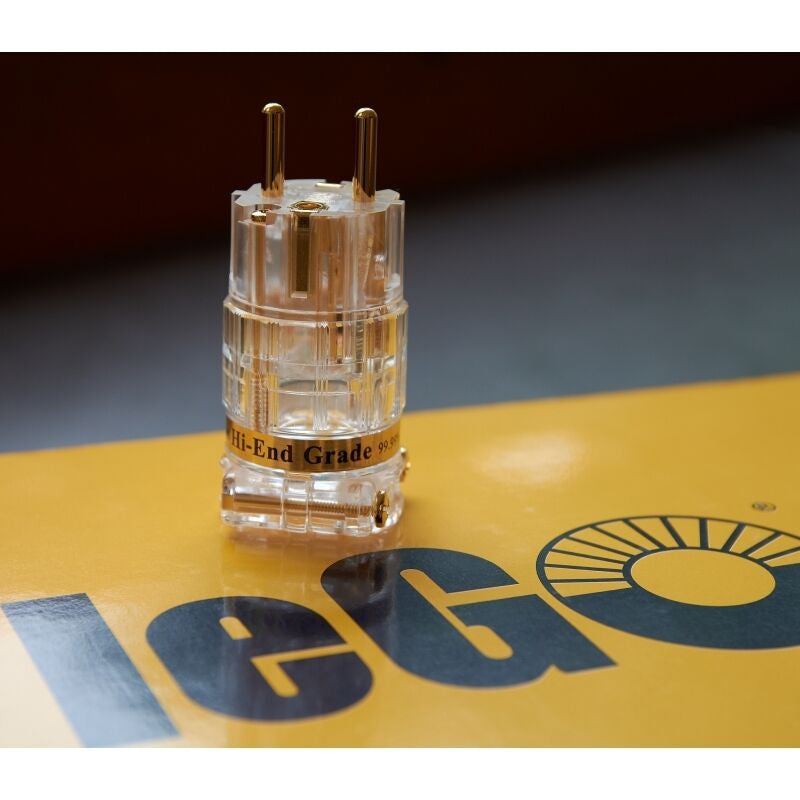 Clear audio tube connector with gold pins and “Hi-End Grade” label