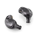 Kinera Hodur black in-ear monitors, close side view with gold driver port openings