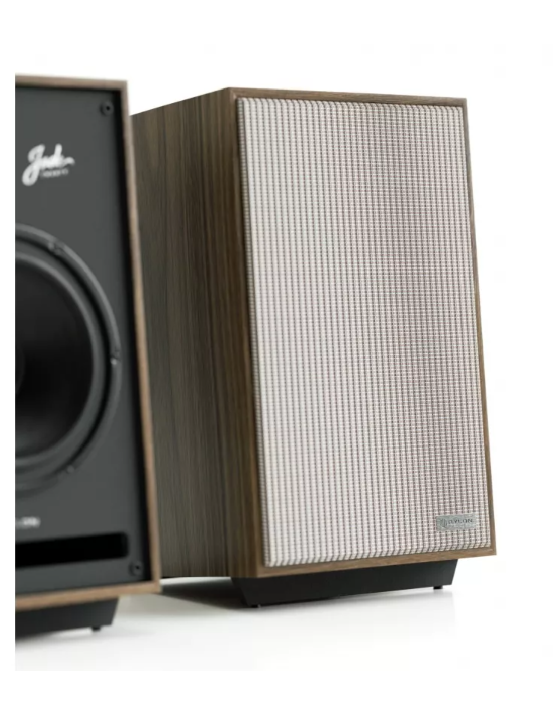Wooden studio speaker with front grille, woofer and tweeter visible through mesh