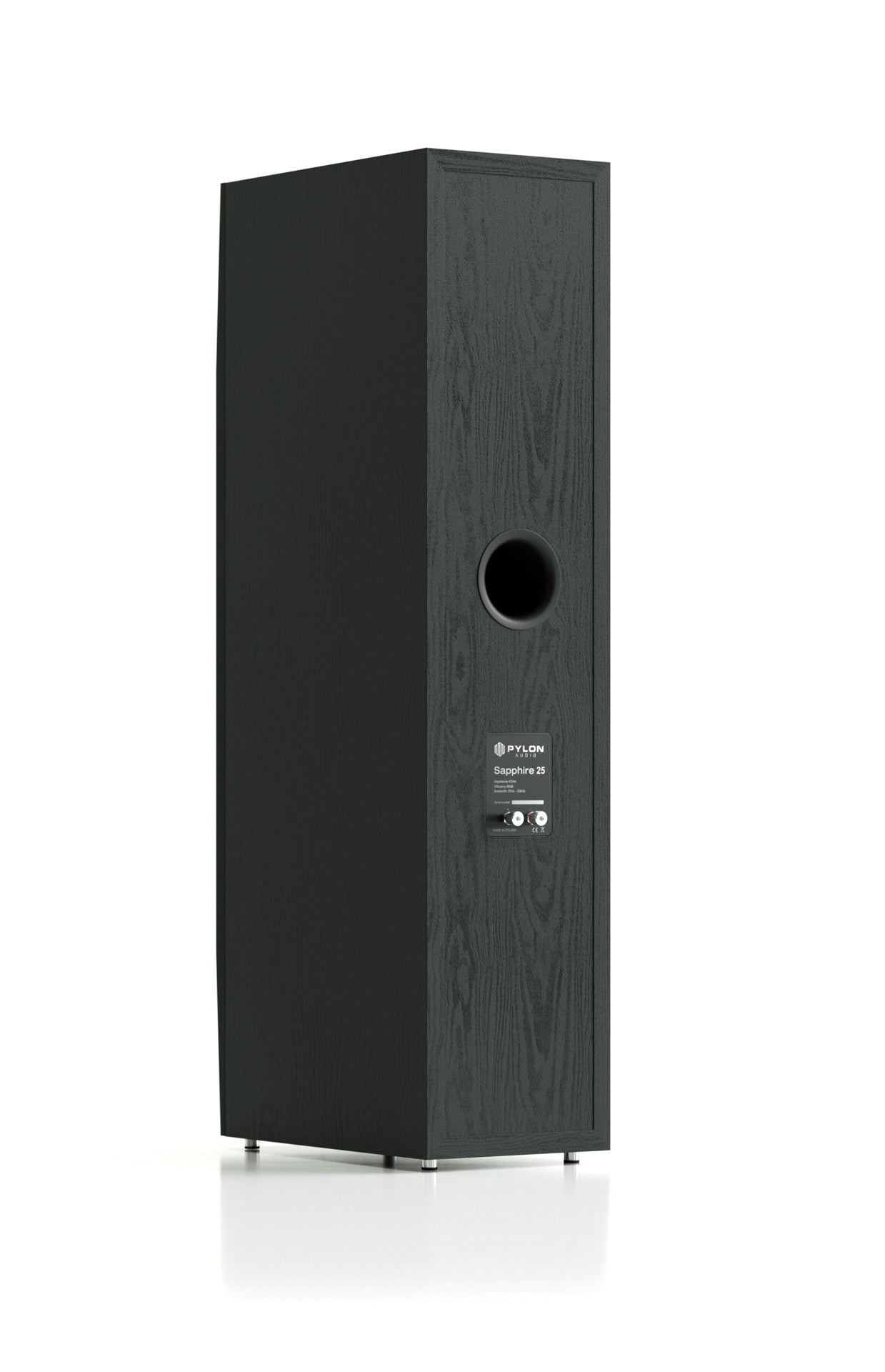 Dark wood bookshelf speaker cabinet with circular bass port and small control panel.