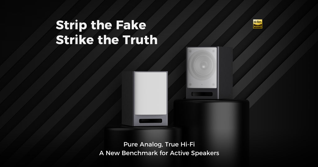 Active loudspeaker pair, one white and one black with front drivers