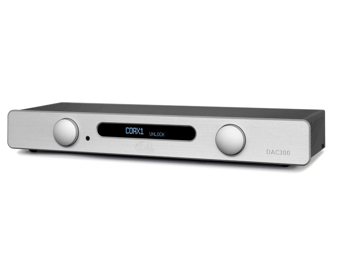 A silver Atoll DAC300 unit with two large silver knobs and a central digital display showing 'COAX1 UNLOCK' and 'DAC300', photographed on a clean white background.