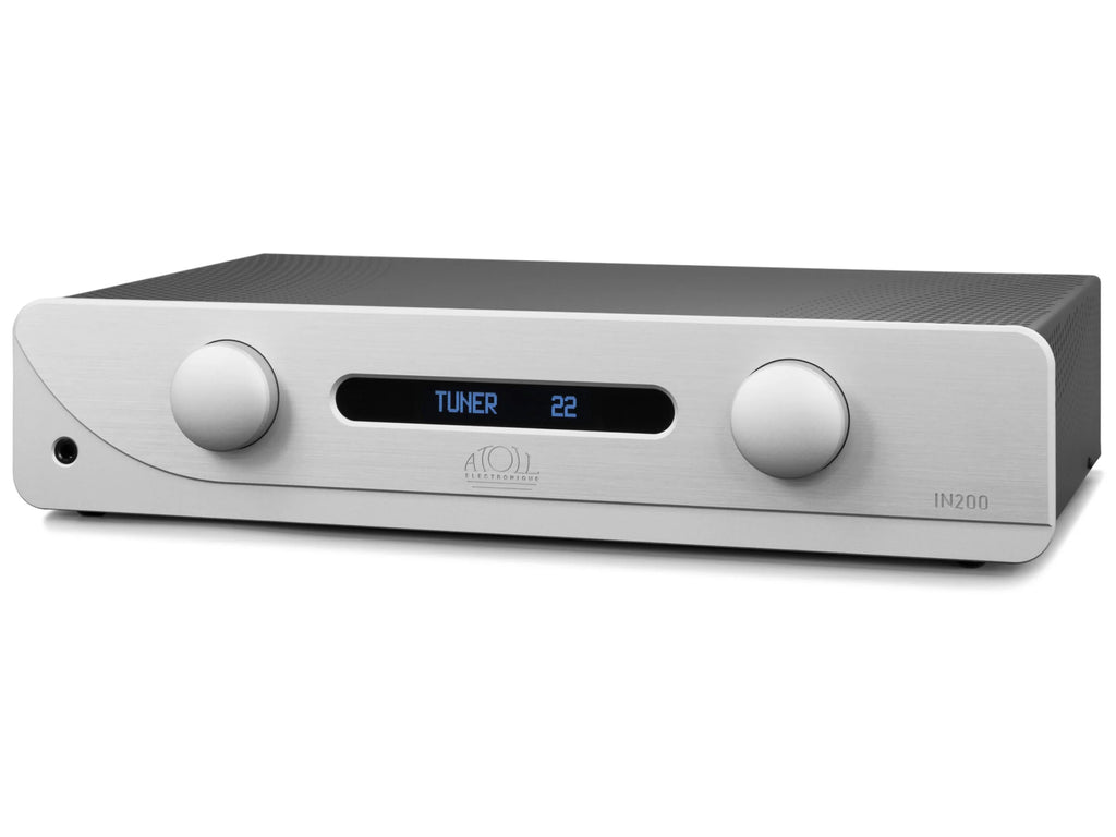 A silver and black atoll IN2000 audio receiver with two large white control knobs and a blue digital display showing 'TUNER 22'.