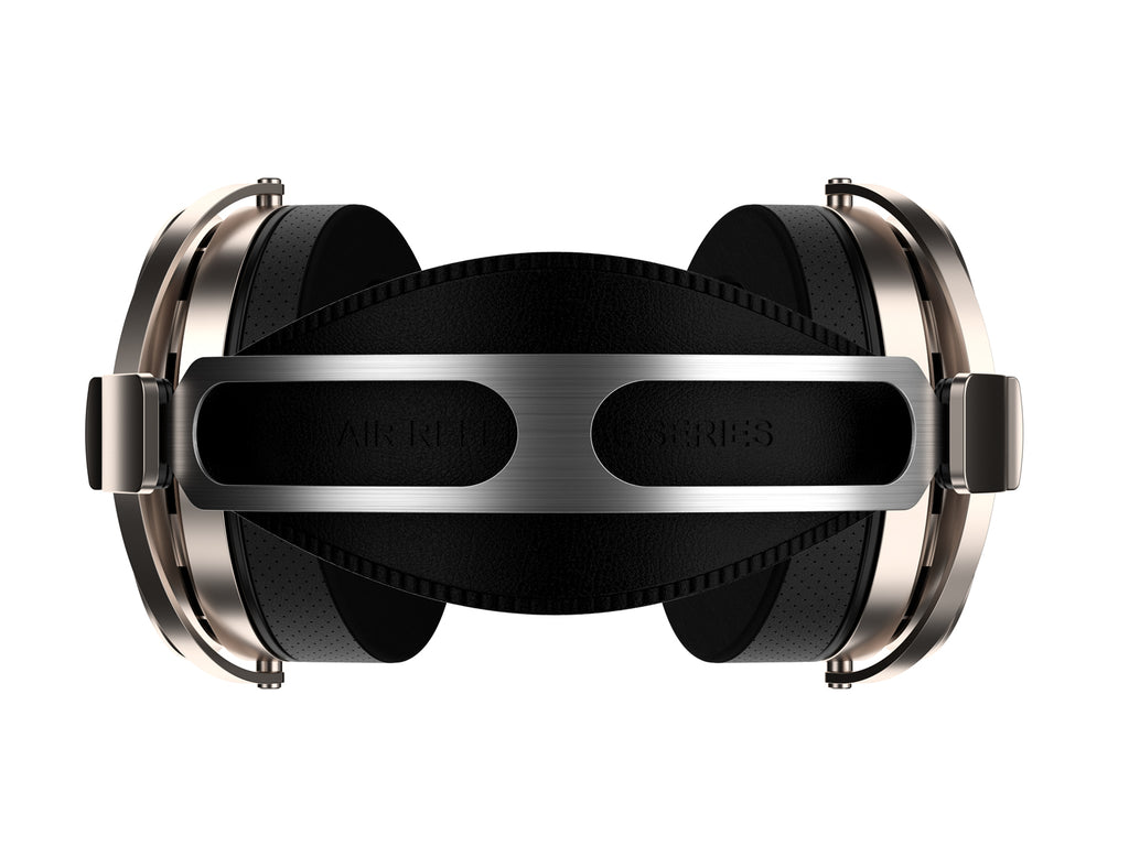The rear view of aune ar5000 MKII over-ear headphones on a solid white background, featuring black ear cushions, a brushed silver metal headband, and silver side frames.