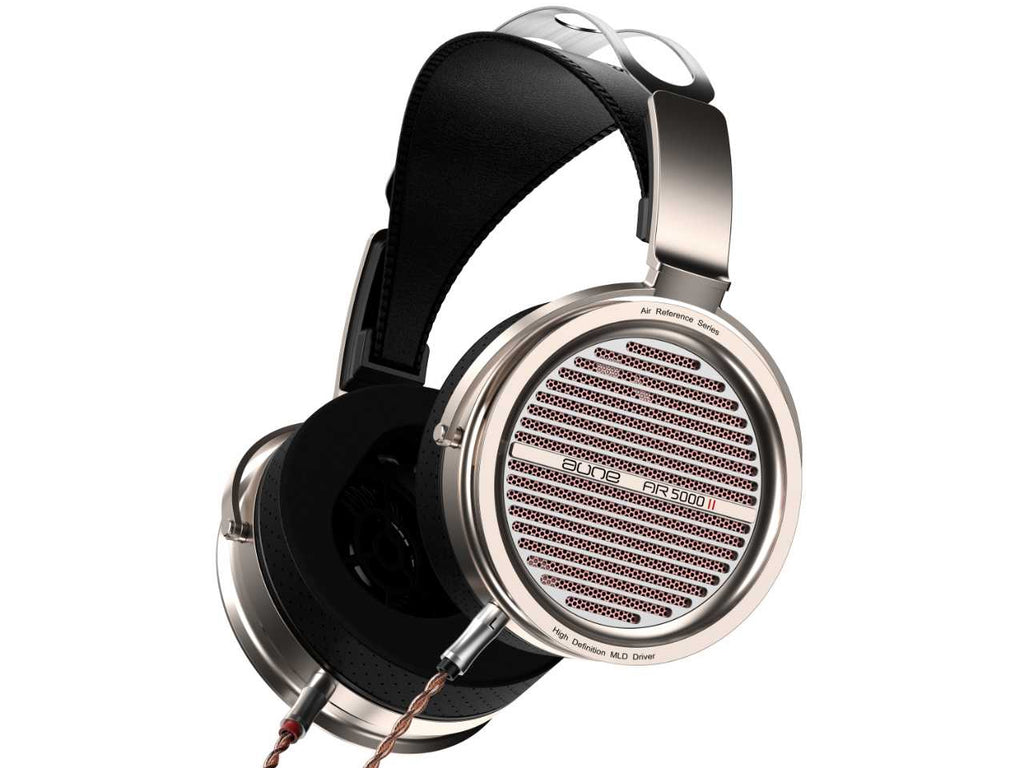 A pair of aune ar5000MKII over-ear headphones with a brushed silver metal finish, black ear cushions, and a brown audio cable, shown on a solid white background.