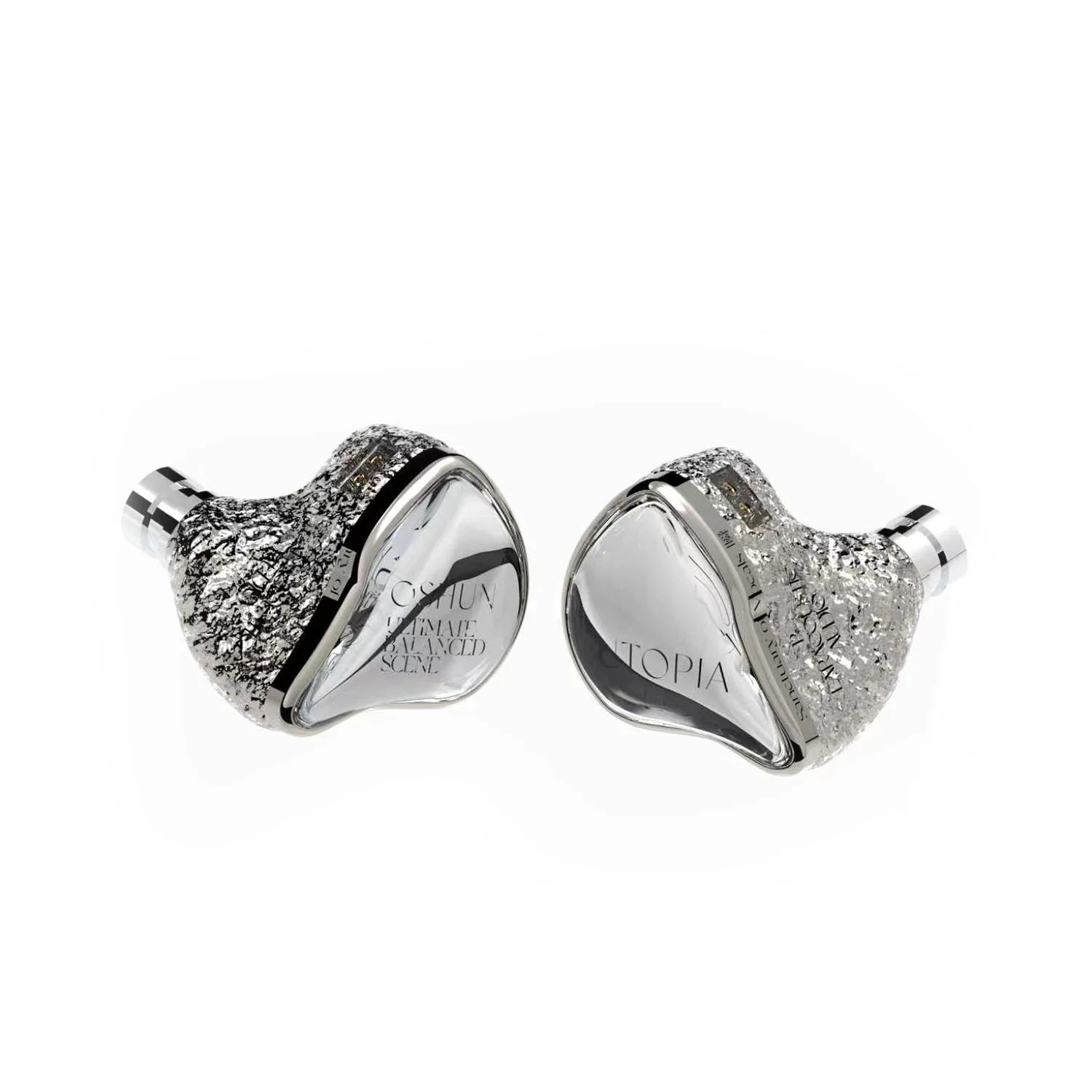 Pair of silver heart-shaped in ear monitors from earacoustic audio on a white background
