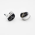In-ear wired earbuds with silver housings and black faceplate, angled view pair