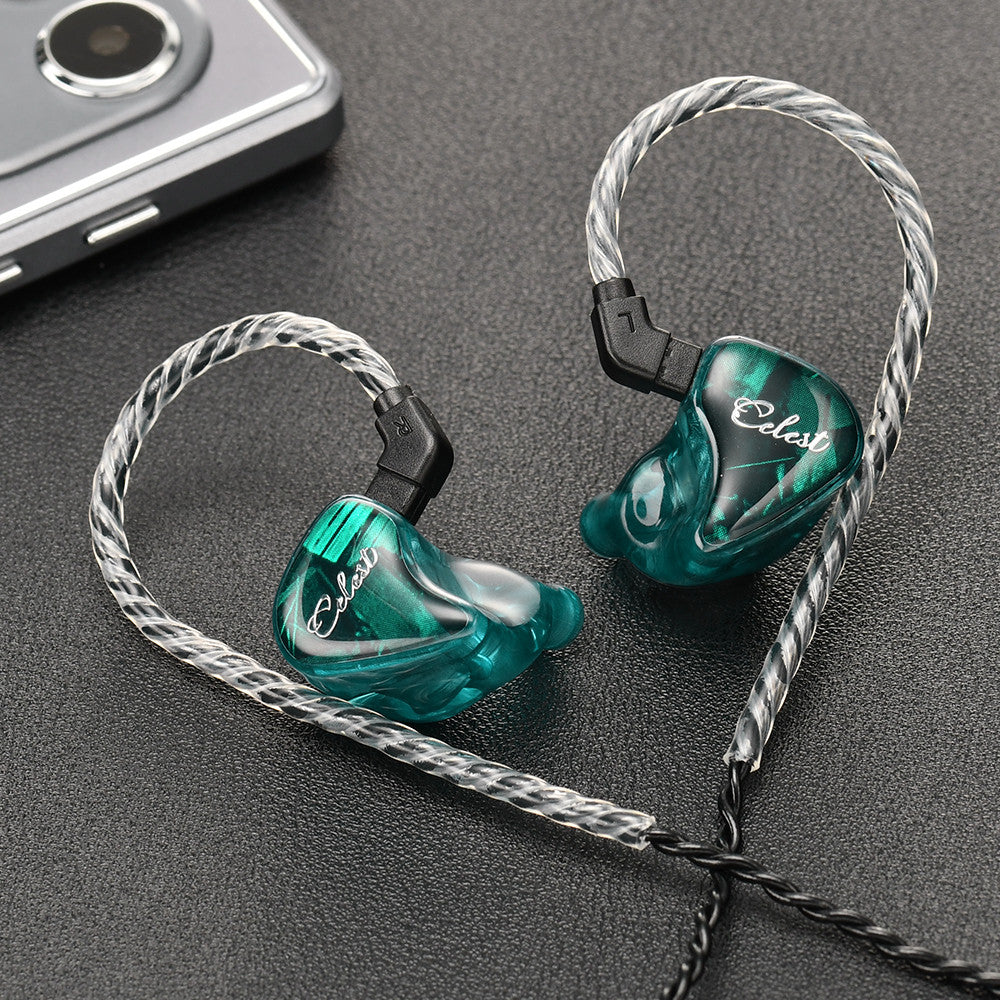 Green in-ear monitor earbuds with braided cable and black connector housings