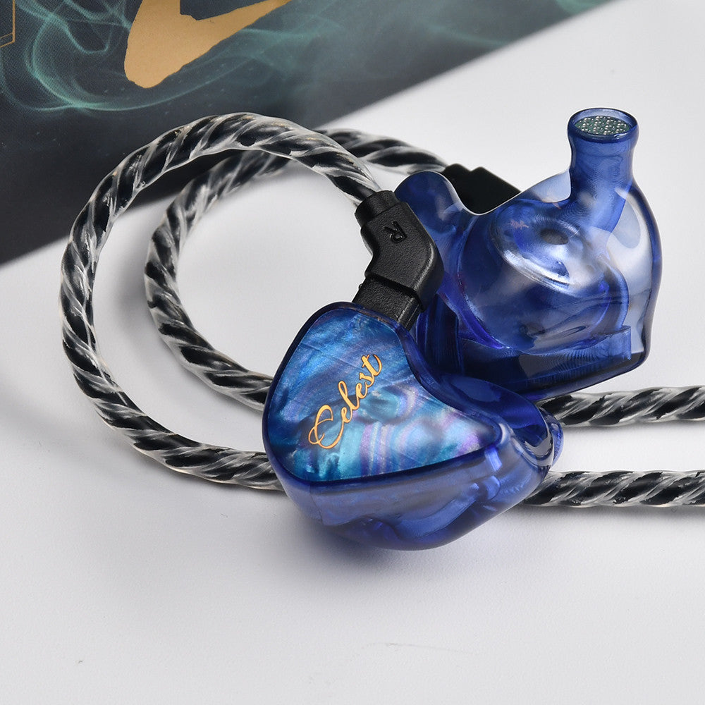 Blue in-ear monitor earbuds with braided cable and clear black ear tips