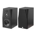 Black NHT C3 stand-mount loudspeaker showing tweeter, woofer, and front panel knobs