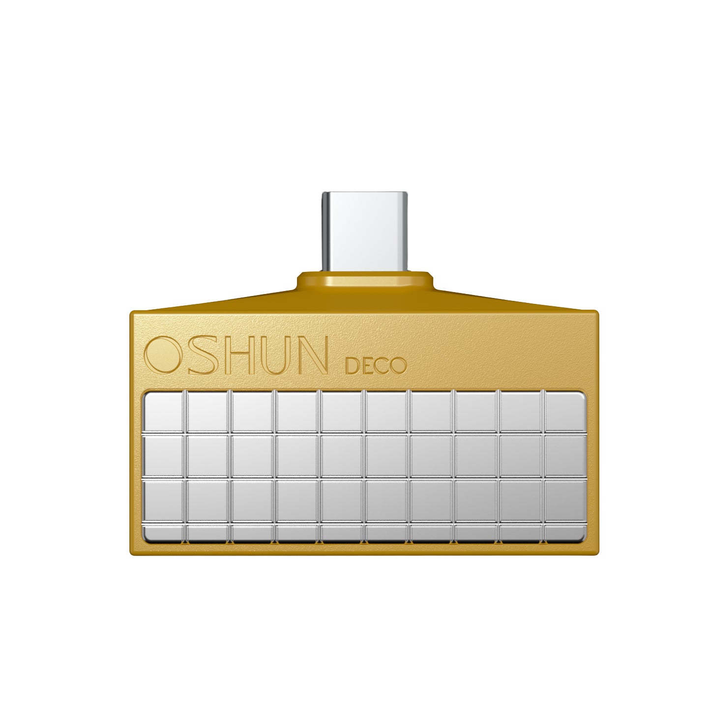 A gold rectangular UB C digital to analogue  converter  with a grid of small silver square tiles on the front and the embossed brand name 'OSHUN DECO' near the top left. The product is centered on a plain white background.