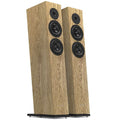 Pair of natural oilwax oak bookshelf speakers with three drivers each, front view.