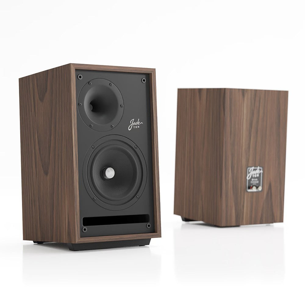 Walnut wood bookshelf speaker cabinet with dual black drivers and rear label