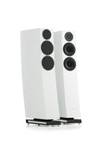 A pair of white tower speakers with black drivers and stands, shown on a clean white background.