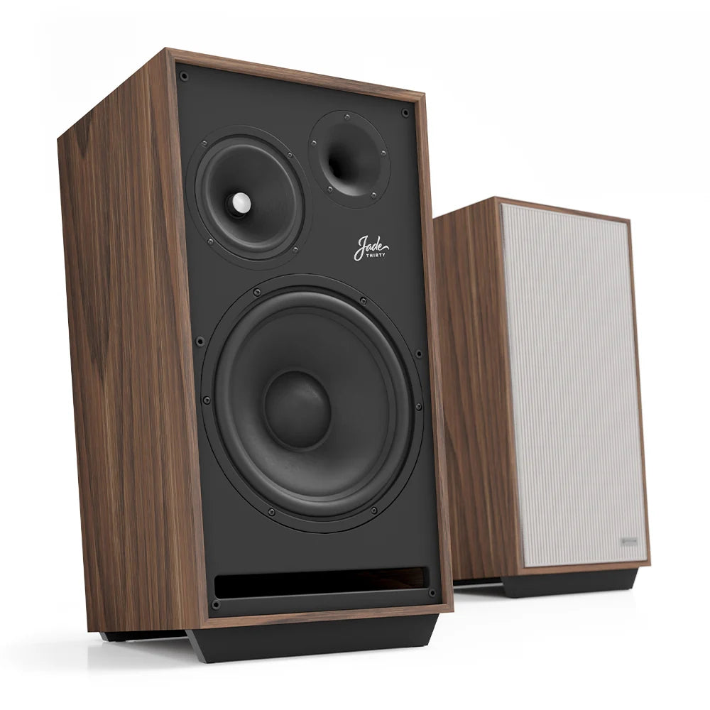 Pair of American walnut floorstanding loudspeakers with black drivers and grille