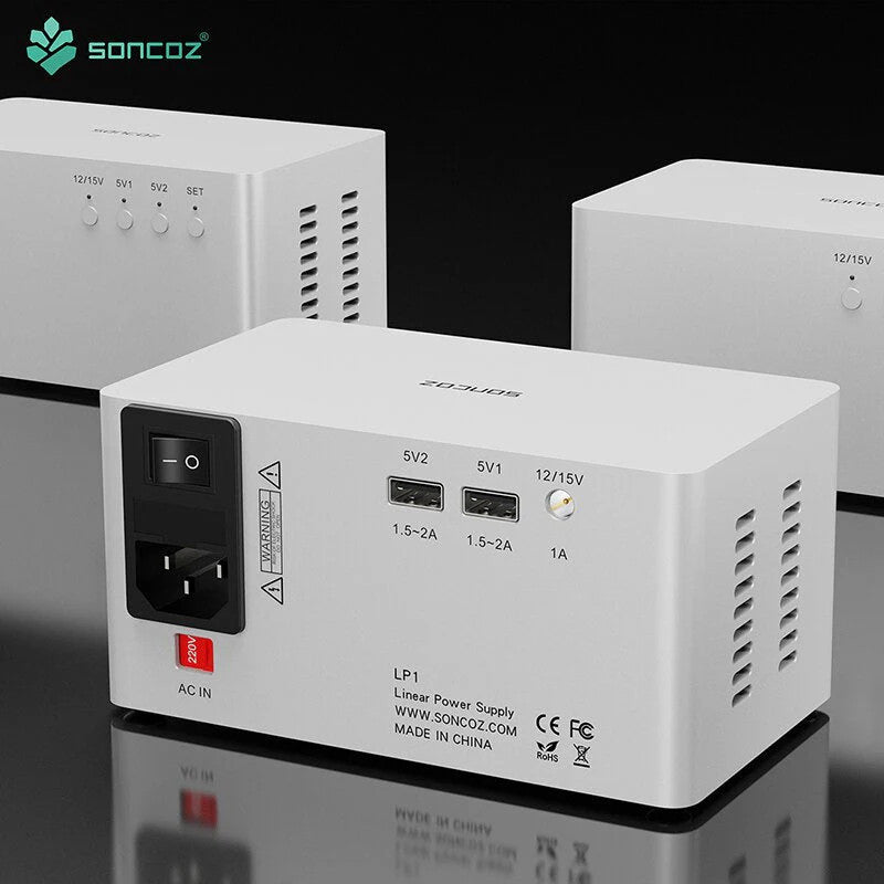 Silver linear power supply with AC inlet, power labels, and vented side panel