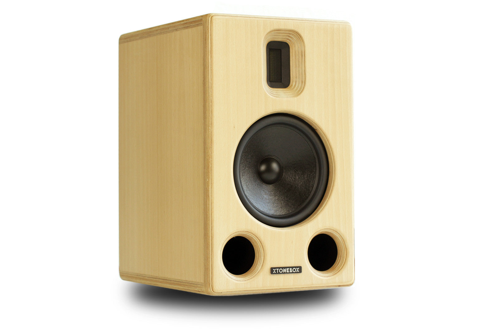 A Studerus XTONEBOX S-7M bookshelf speaker with a light natural wood grain cabinet, a black midrange driver, and two black port holes, shown on a white background.