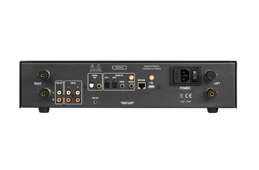 Rear panel of a black home theater receiver or amplifier, showing various audio and network input connectors, power socket, and port labels on a white background.