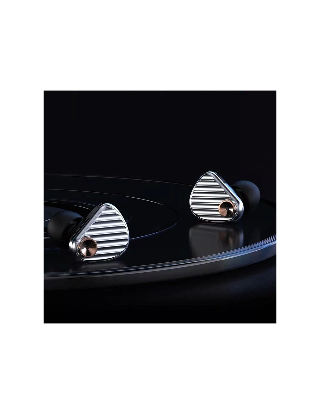 In-ear monitors with silver ribbed sound ports and copper braided cables