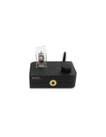 Black headphone amplifier with front knob and gold audio jack