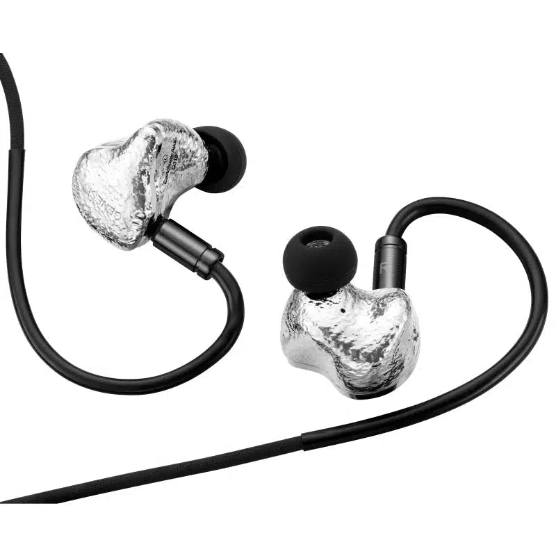 A pair of in-ear headphones with a textured metallic silver finish and black silicone ear tips, connected by a black cable on a plain white background.