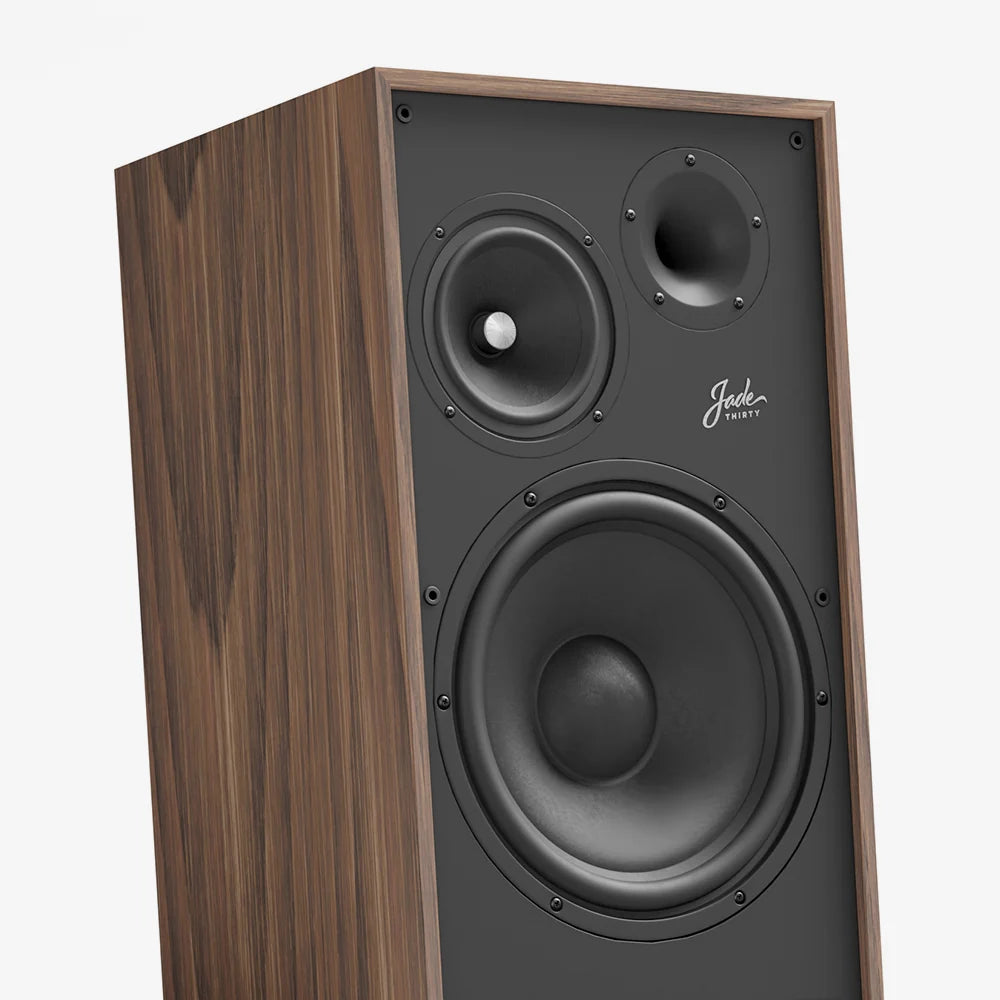 American walnut floorstanding loudspeaker close-up of black speaker cones