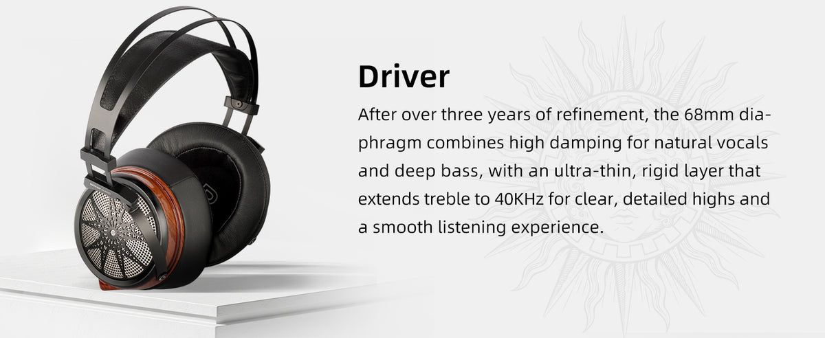 A pair of over-ear audiophile headphones with black earcups, orange accent rings, and silver inner grilles, shown on a white surface next to a text block detailing the driver specifications.